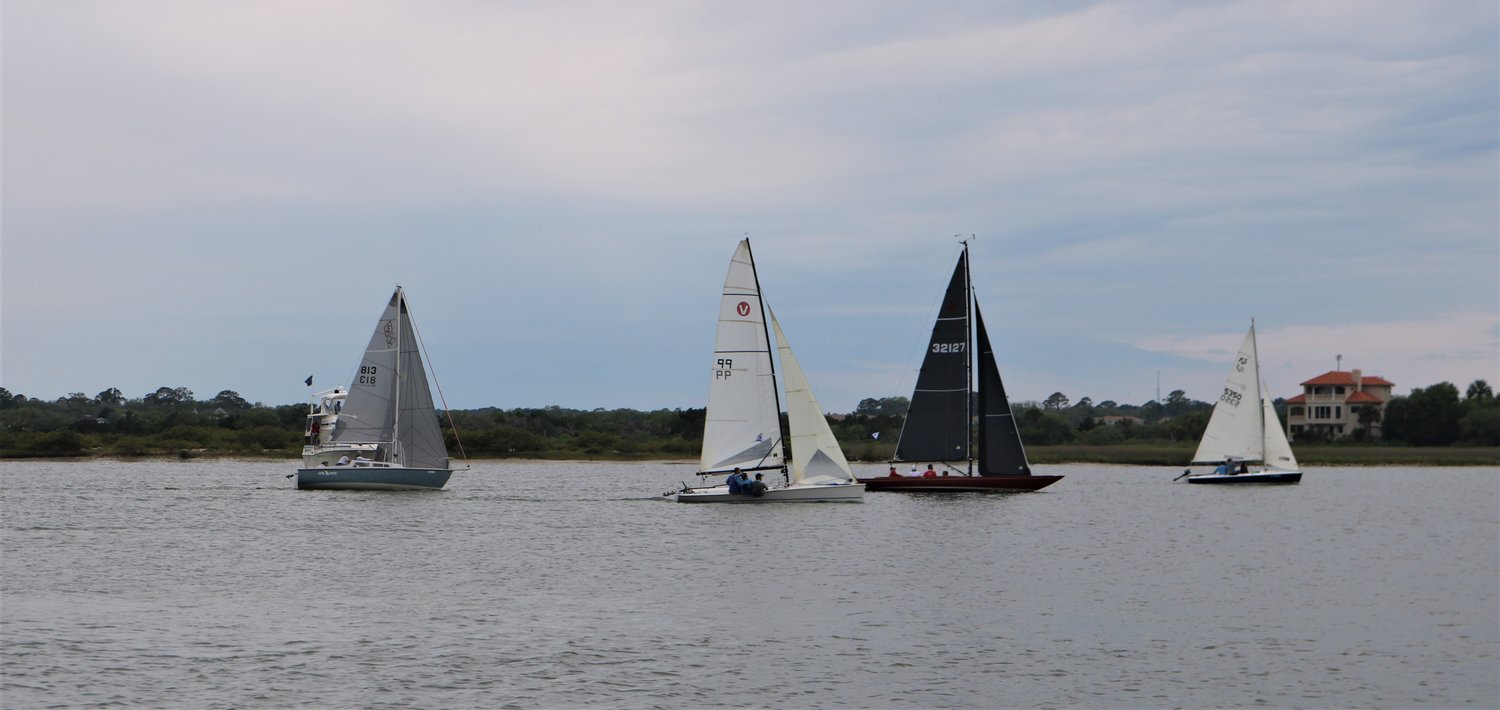 Some of the sailboats in the St. Augustine Race Week Inshore Races on the Tolomato River start for the first buoy.